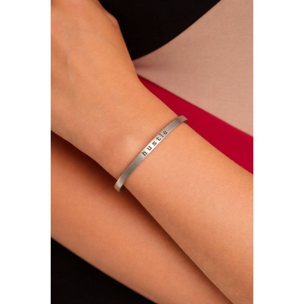 Minimalist Engraved Hustle Cuff Bracelet Sleek Silver Tone Inspirational Bangle